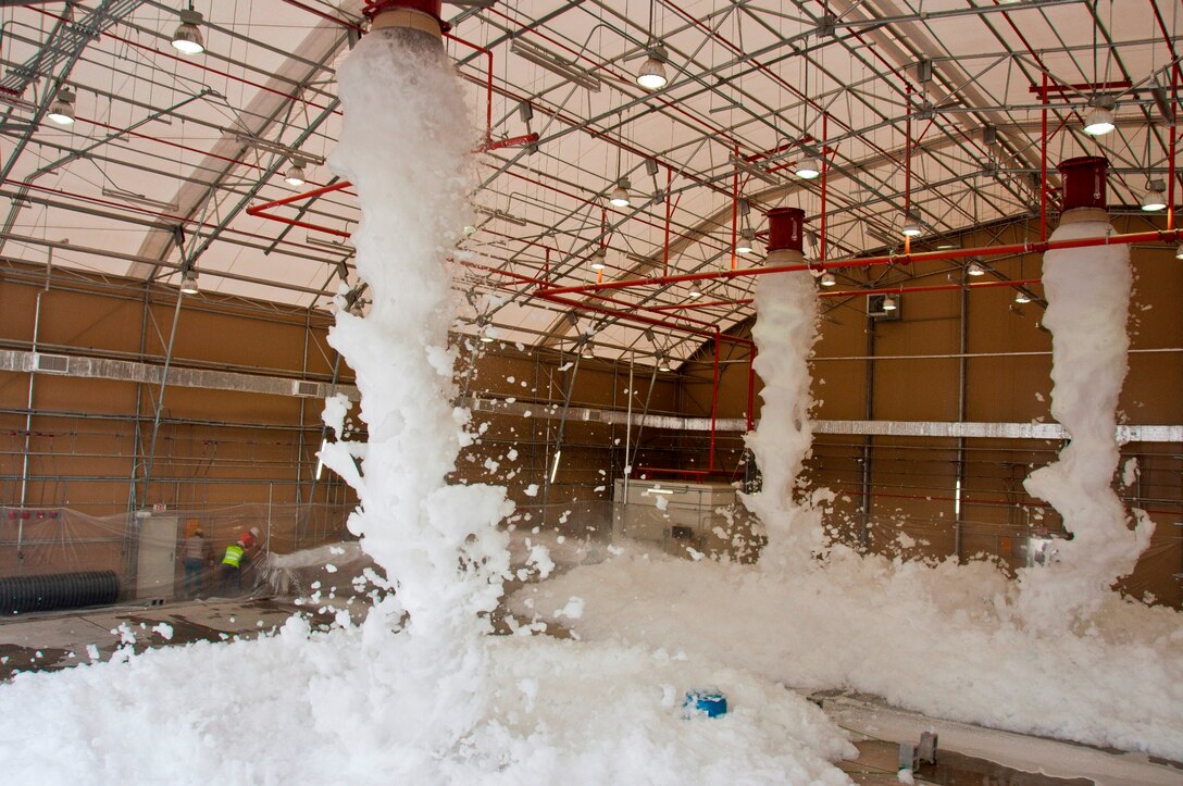 Foam tests, such as this one at a newly constructed aircraft hanger on Kandahar Airfield are critical to ensuring that fire suppression systems operate as designed. The U.S. Army Corps of Engineers oversaw dozens of these tests across south and west Afghanistan in 2011 and 2012.