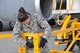 Airman 1st Class Valerie Richardson, 15th Medical Operations Squadron aerospace medical technician, prepares a patient transport system Dec. 3 for use with the KC-10 Extender Dec. 3. The Extender is undergoing 