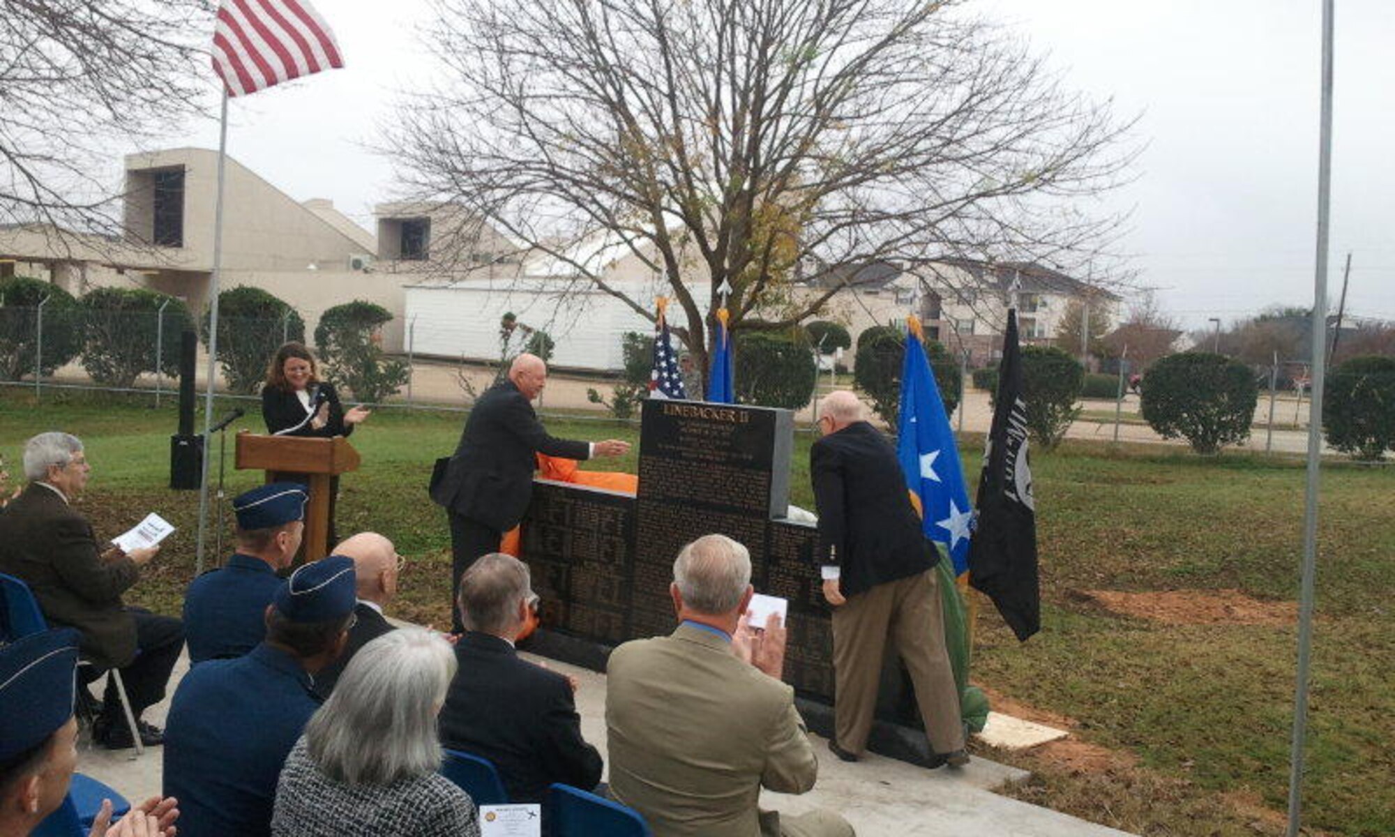 Rev. (USAF Col. Retired) Robert Certain and Lt. Col. (USAF Retired) John Yuill, veterans of Operation Linebacker II, unveil a memorial to the veterans of the operation during a ceremony Dec. 8 at the Barksdale Global Power Museum, Barksdale Air Force Base, La. (U.S. Air Force photo/Senior Airman Micaiah Anthony)