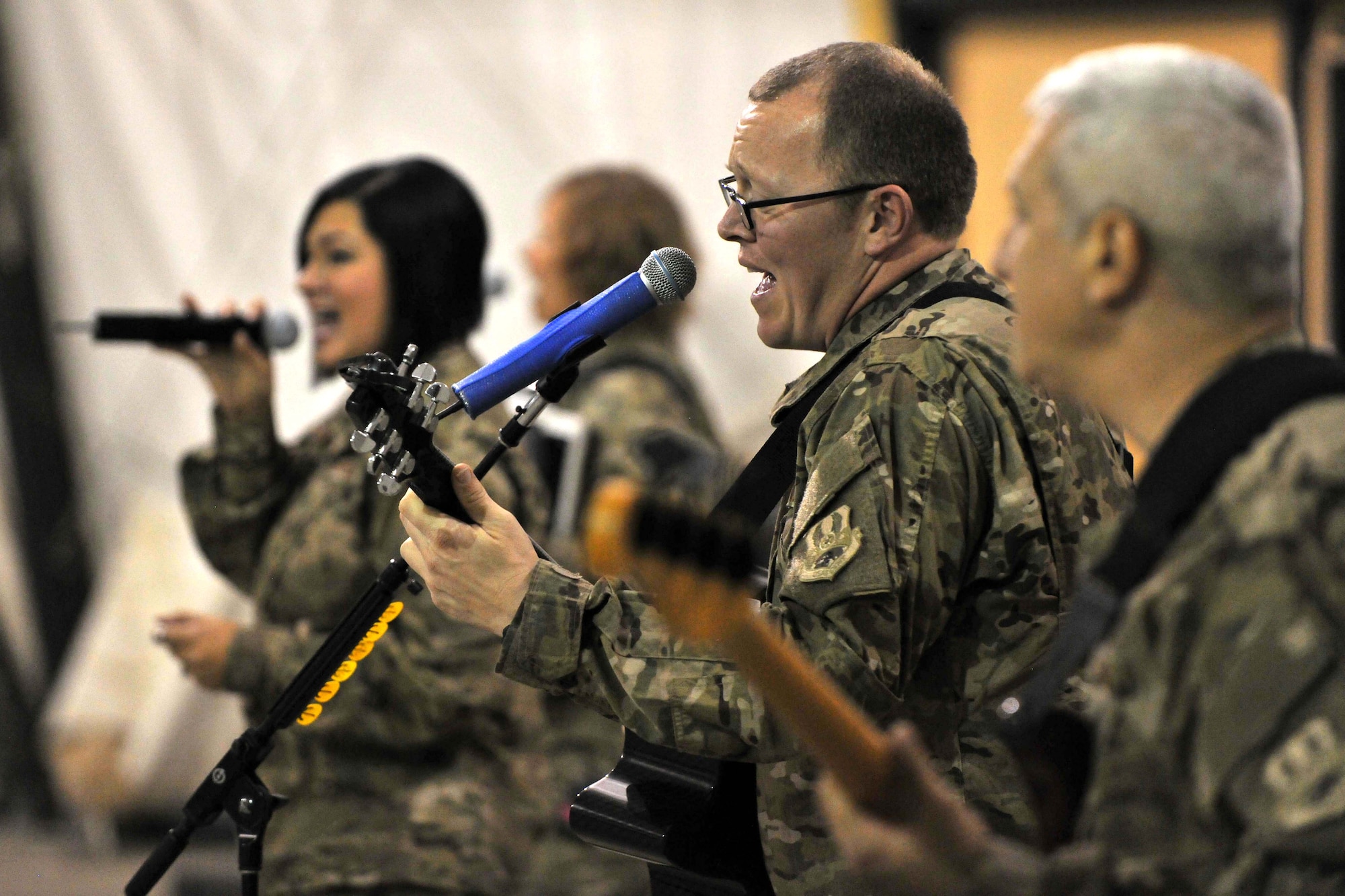U.S. Air Forces Central Command Band performs for flightline personnel at Bagram Airfield, Afghanistan, Dec. 7, 2012. USAFCENT musicians perform and tour in small ensembles throughout the area of responsibility to positively promote troop morale, diplomacy and outreach to host nation communities.  (U.S. Air Force photo/Senior Airman Chris Willis)