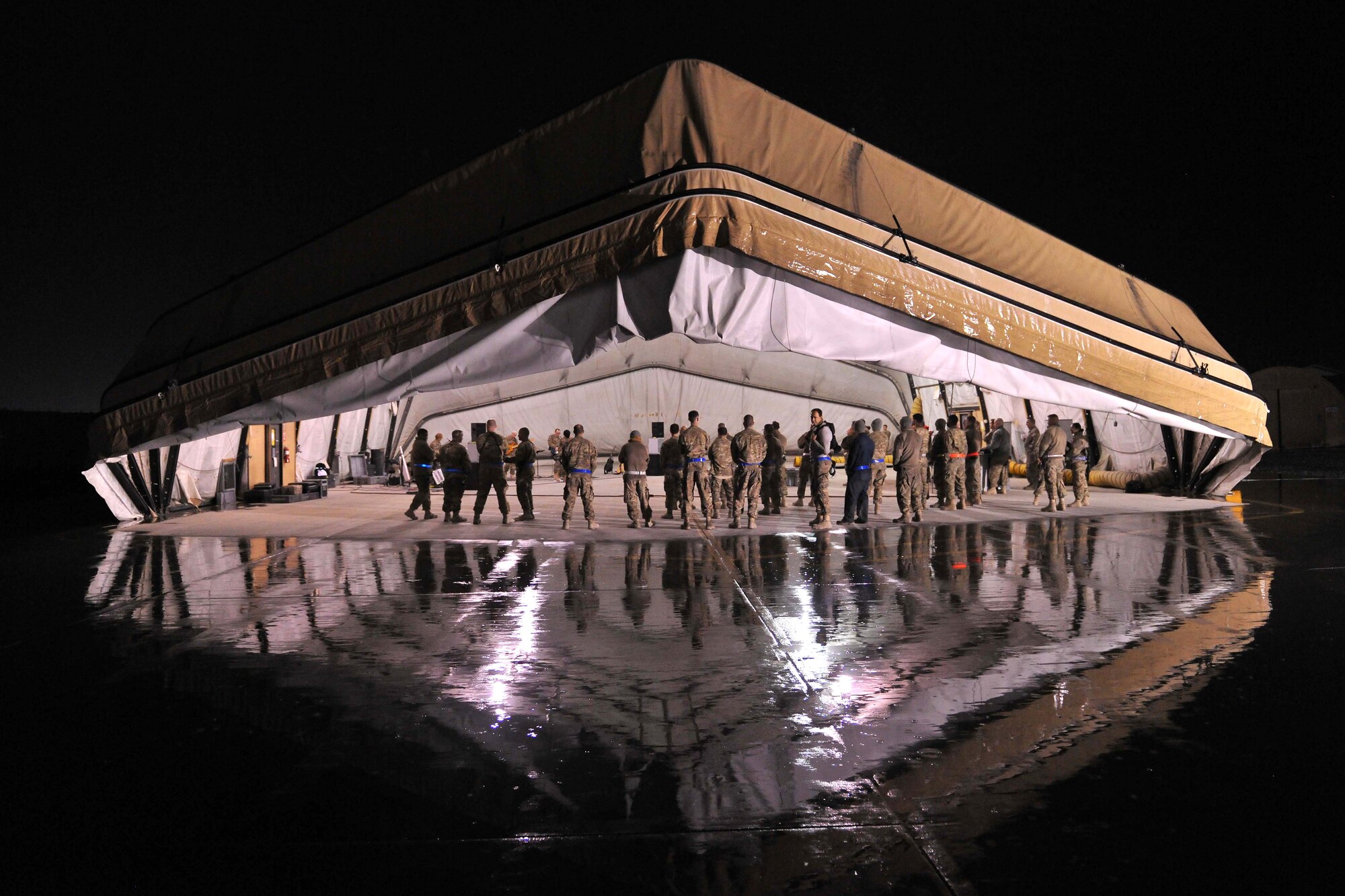 U.S. Air Forces Central Command’s band Total Force performs for flightline personnel at Bagram Airfield, Afghanistan, Dec. 7, 2012. USAFCENT’s musicians perform and tour in small ensembles throughout the area of responsibility to positively promote troop morale, diplomacy and outreach to host nation communities.  (U.S. Air Force photo/Senior Airman Chris Willis) 