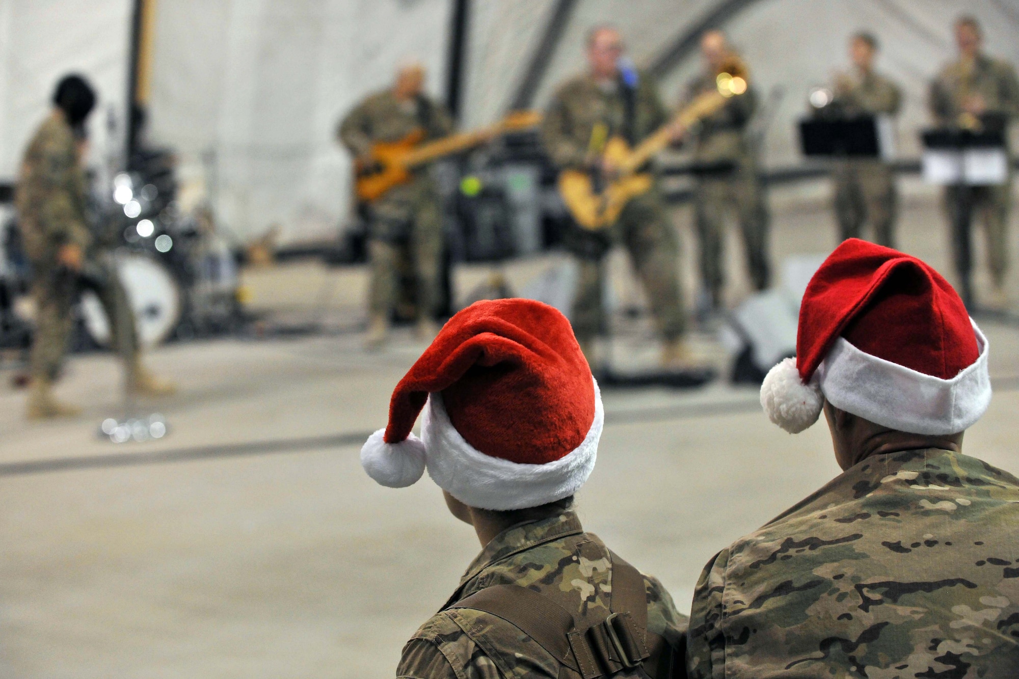 U.S. Air Forces Central Command’s band Total Force performs for flightline personnel at Bagram Airfield, Afghanistan, Dec. 7, 2012. USAFCENT’s musicians perform and tour in small ensembles throughout the area of responsibility to positively promote troop morale, diplomacy and outreach to host nation communities.  (U.S. Air Force photo/Senior Airman Chris Willis) 