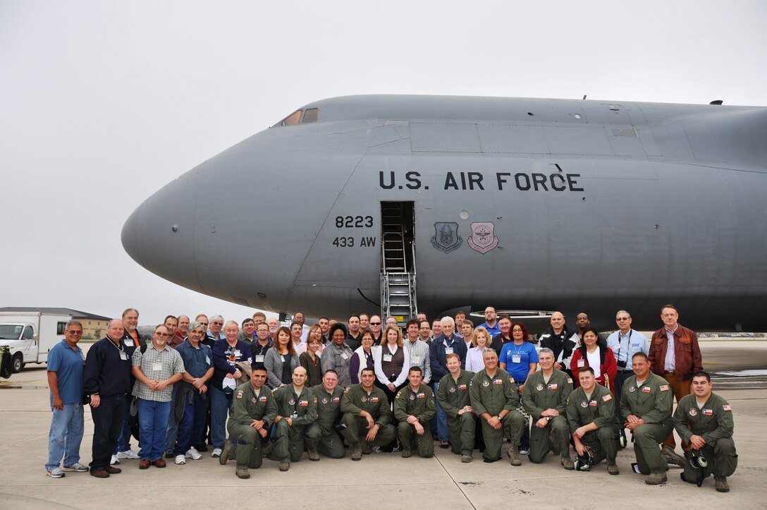 Cvilian employers of 433rd Airlift Wing Reservists pose for a group photo before flying aboard an Alamo Wing C-5A Galaxy, to see an in-flight aerial refueling mission with a KC-135 Stratotanker over West Texas.The 433rd Airlift Wing held its 19th annual Employers' Day Joint Base San Antonio-Lackland, Texas , Sat., Dec. 8, 2012. (Air Force photo/Tech Sgt. Carlos J. Trevino) 