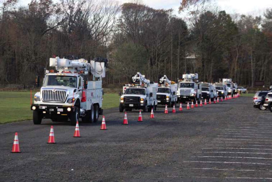 Utility trucks line up at Stewart Air National Guard Base, awaiting fuel and area assignments during restoration efforts throughout New York and New Jersey, just after Super-storm Sandy struck the East Coast. The vehicles were airlifted by C-17 Globemaster III and C-5 Galaxy aircraft from March Air Reserve Base, Travis Air Force Base and Joint Base Lewis-McChord AFB. (U.S. Air Force photo by Chief Master Sgt. James Wood)