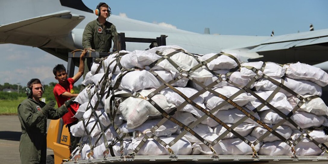 Marine Corps KC-130J Hercules aircraft carrying relief goods from Manila arrives in Davao City. U.S. Marine Forces Pacific Command has sent personnel and supplies to transport loads of humanitarian assistance and disaster relief supplies via C-130 aircraft. Two C-130's arrived in Manila from Okinawa on Saturday. U.S. and Philippine military personnel worked side by side to load the first C-130 flight that carried relief supplies to Davao yesterday. The Marines and aircraft are with Marine Aerial Refueler Transport Squadron 152, Marine Aircraft Group 36, 1st Marine Aircraft Wing, III MEF. 