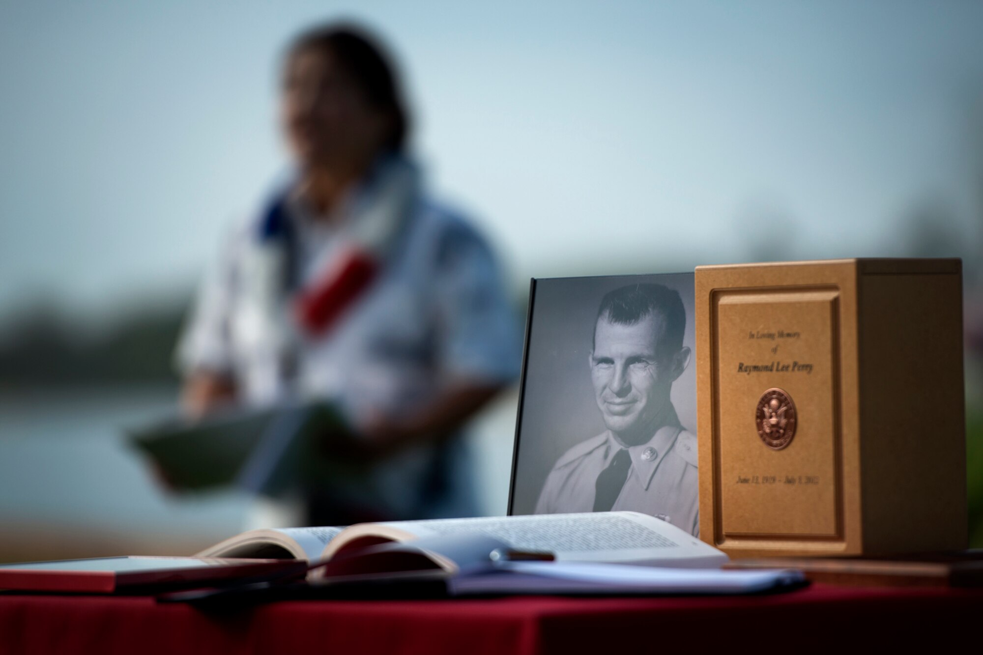 Senior Master Sgt. (Ret.) Raymond Perry, attended his final remembrance ceremony alongside his wife, Elizabeth, and family, during the 71st anniversary remembrance ceremony on Joint Base Pearl Harbor-Hickam, Dec. 7, 2012. Perry, a survivor of the attacks, went on to serve 26-years in the Air Force and was a founding member of the pararescue career field. He returned to Hickam and serve for more than 20 years as a fire inspector for the Hickam fire department. After the ceremony, the family and friends of Perry scattered his ashes in the waters of Pearl Harbor during a private ceremony.  (U.S. Air Force photo/Staff Sgt. Mike Meares)