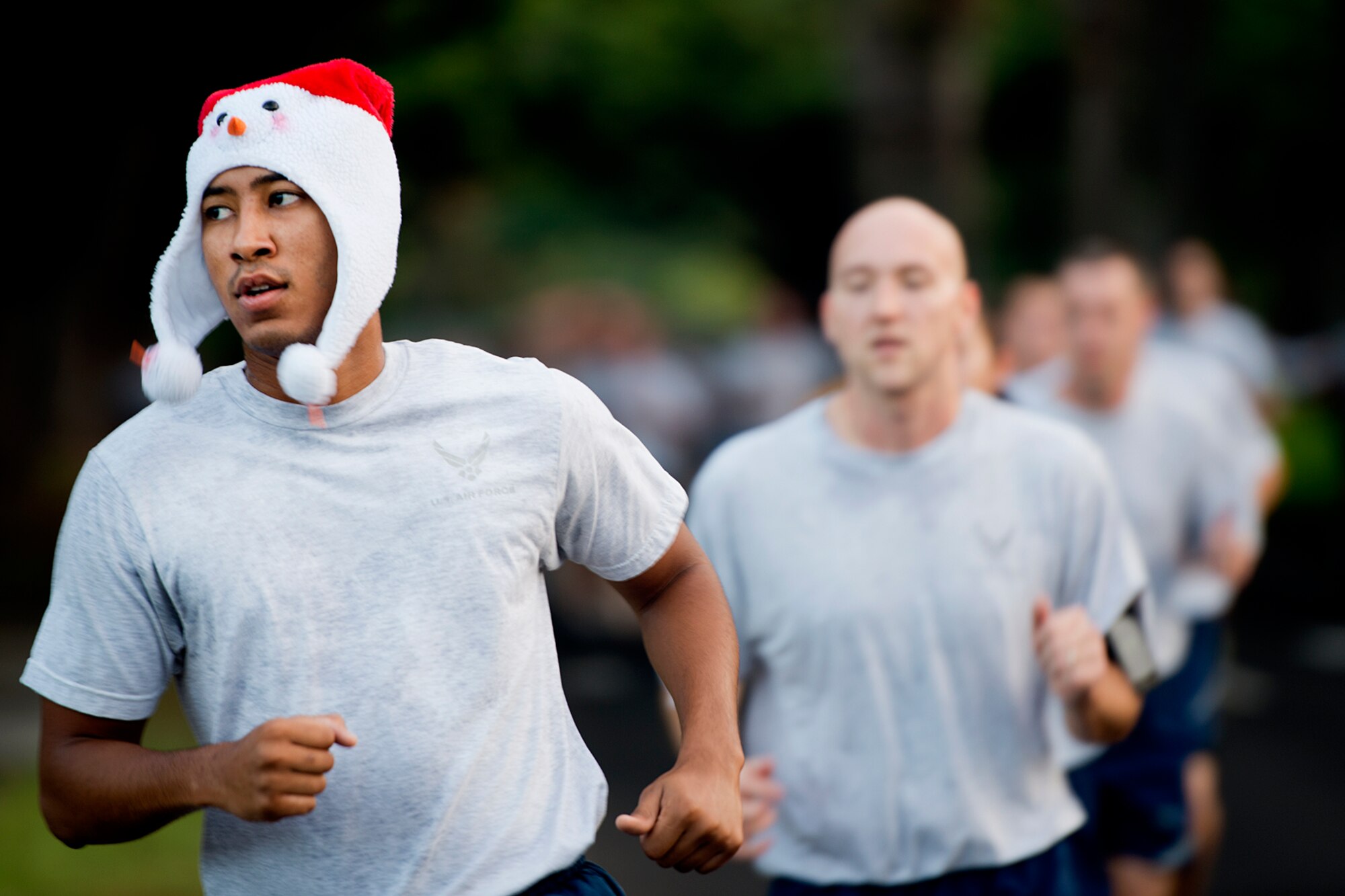 Senior Airman Syd Bodden, 8th Intelligence Squadron intel analyst, shows his holiday spirit during the Dec. 6, 2012, fun run on Hickam Field, Joint Base Pearl Harbor-Hickam, Hawaii. The run is typically held the first Friday of each month, but was moved for Dec. 7 ceremonies. (U.S. Air Force Base photo/Staff Sgt. Mike Meares)