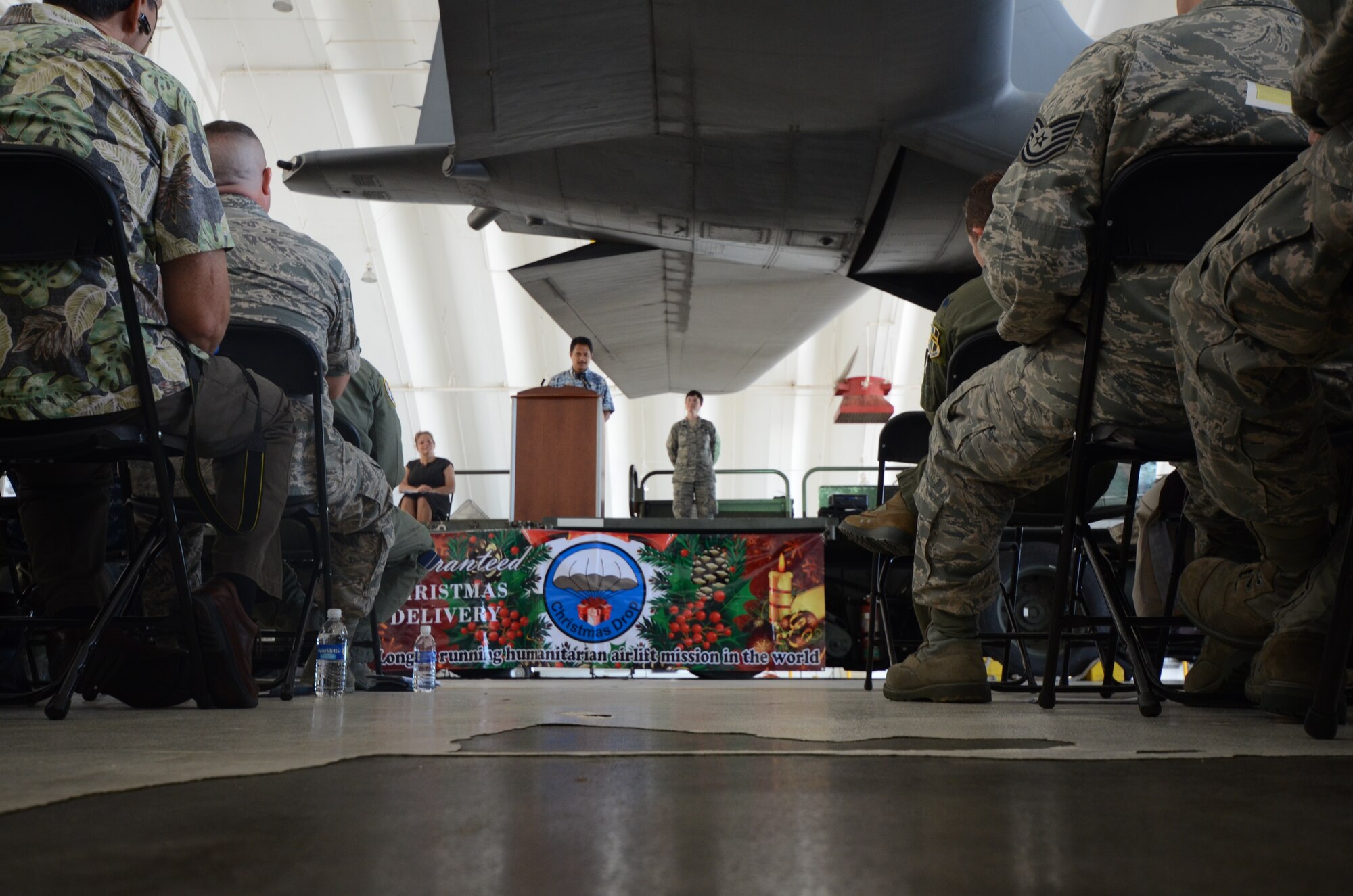 Manny Hechanova, University of Guam associate director of telecommunications and distance education operations, speaks during the Operation Christmas Drop Push Ceremony at Andersen Air Force Base, Guam, on Dec. 11, 2012. Operation Christmas Drop is a non-profit organization powered by volunteers from Andersen Air Force Base and the local Guam community. Each year OCD provides aid to more than 30,000 islanders in Chuuk, Palau, Yap, Marshall Islands and Commonwealth of the Northern Mariana Islands. This year is the 61st anniversary of OCD, making it the longest running humanitarian mission in the world. The day of the OCD push ceremony was the first of eight planned days of air drops with 16 total airdrops to 54 islands planned. (U.S. Air Force photo by Senior Airman Benjamin Wiseman/Released)