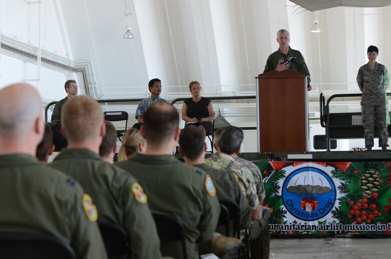 Col. Donald Drechsler, 36th Wing vice commander, speaks during the Operation Christmas Drop Push Ceremony at Andersen Air Force Base, Guam, on Dec. 11, 2012. Operation Christmas Drop is a non-profit organization powered by volunteers from Andersen Air Force Base and the local Guam community. Each year OCD provides aid to more than 30,000 islanders in Chuuk, Palau, Yap, Marshall Islands and Commonwealth of the Northern Mariana Islands. This year is the 61st anniversary of OCD, making it the longest running humanitarian mission in the world. The day of the OCD push ceremony was the first of eight planned days of air drops with 16 total airdrops to 54 islands planned. (U.S. Air Force photo by Senior Airman Benjamin Wiseman/Released)