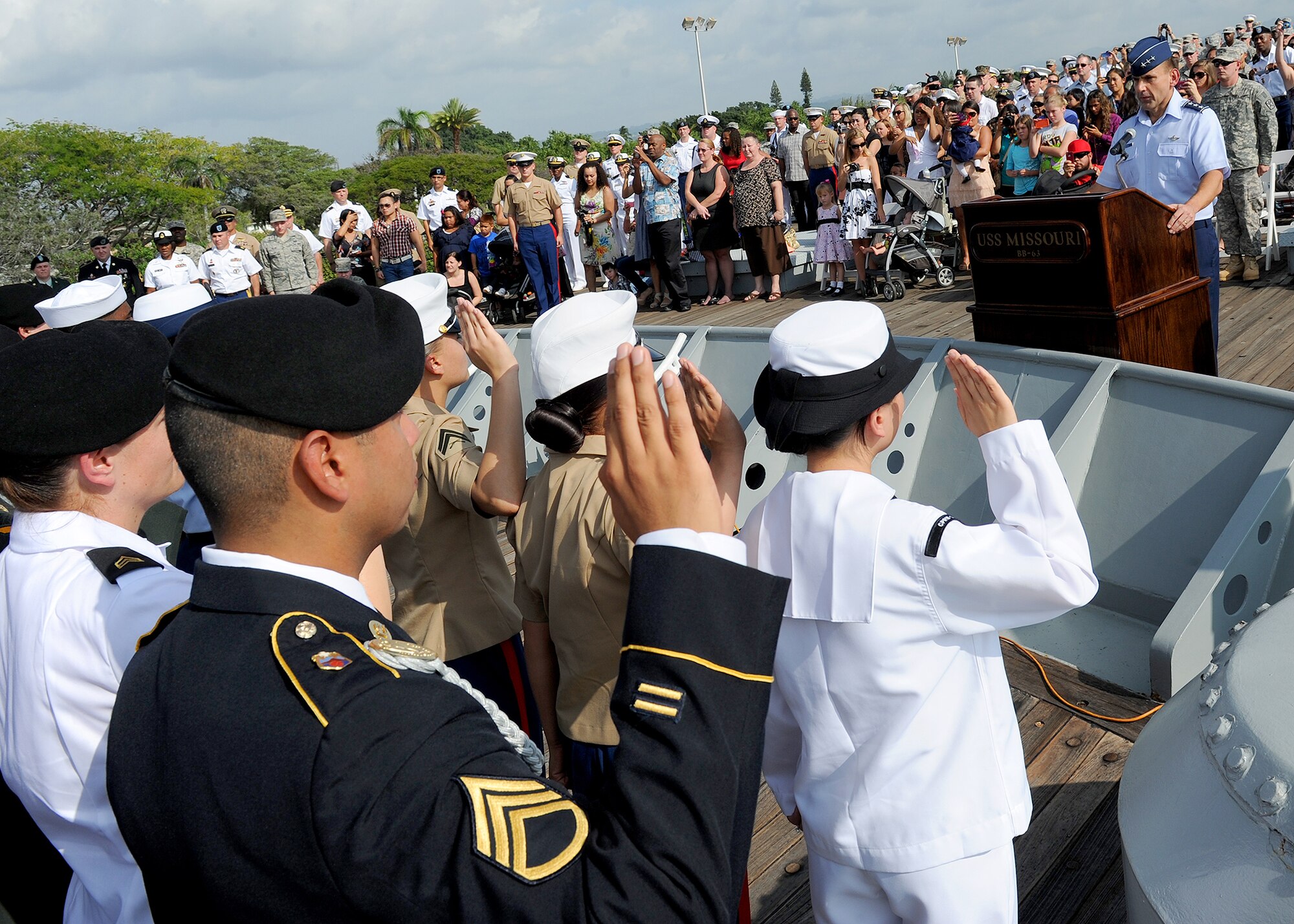 In commemoration of the 71st anniversary attacks of Pearl Harbor, Lt. Gen. Ted Kresge, Pacific Air Forces vice commander, administers the oath of appointment to joint service members during a special mass re-enlistment ceremony aboard the USS Missouri Memorial, Pearl Harbor, Hawaii, Dec. 7, 2012. (U.S. Air Force photo/Tech. Sgt. Jerome S. Tayborn) 