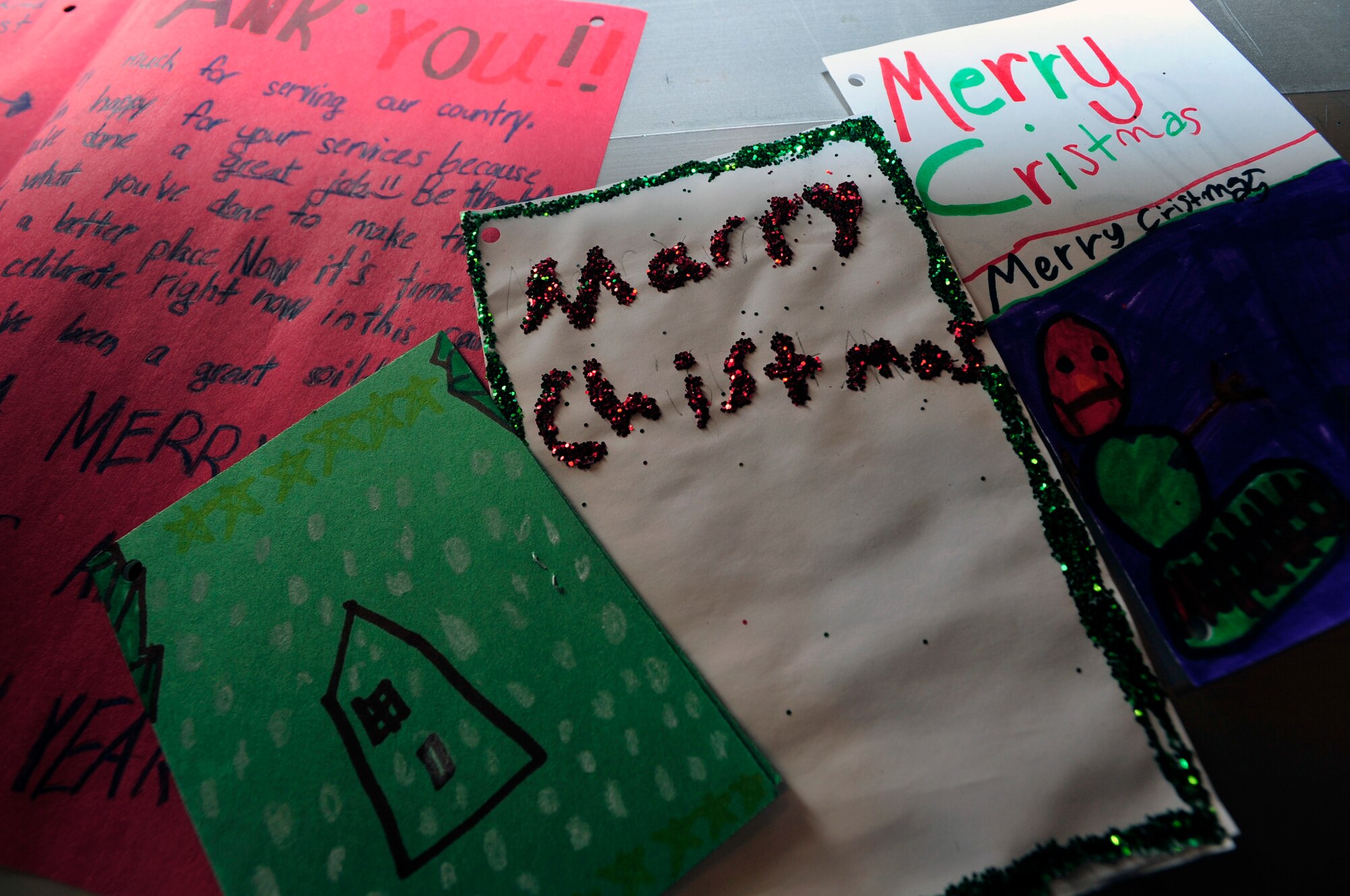 Handmade holiday cards were requested through Operation Sweet Treat to spread cheer and show appreciation to service members stationed across the Republic of Korea. More than 13,000 cards were made by children throughout the country and the United States. (U.S. Air Force photo/Airman 1st Class Alexis Siekert)