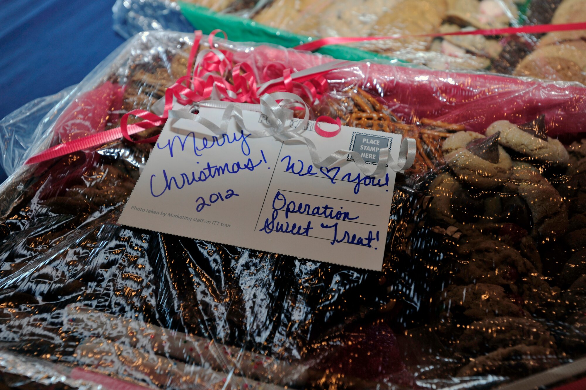 More than 15,000 homemade cookies and treats donated by base community members were collected and packaged for delivery at the Osan Officers’ Club, Dec. 10, 2012. First sergeants delivered the treats on behalf of Operation Sweet Treat. (U.S. Air Force photo/Airman 1st Class Alexis Siekert) 