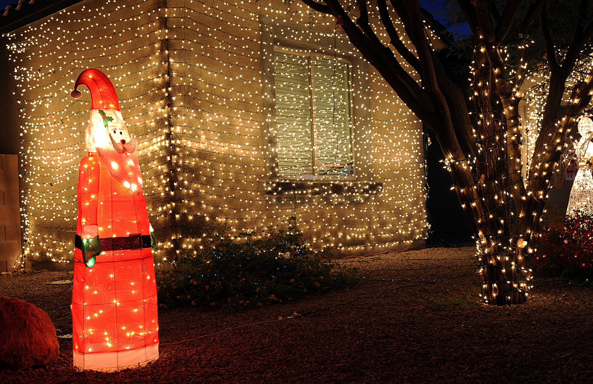 Christmas decorations display on the house of U.S. Air Force 1st Lt. Joshua Palochak, 41st Electronic Combat Squadron, in Tucson, Ariz., Dec. 1, 2012. Palochak has used his decorations to raise toy donations for the Marine Toys for Tots Foundation. (U.S. Air Force photo by Senior Airman Timothy Moore/Released)