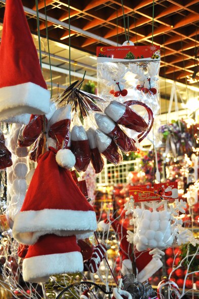 Santa hats, stockings, bells and ornaments are among the many seasonal decorations at the Holiday Shop, Flower Market at the Express Bus Terminal in Seoul, Republic of Korea. The shop also includes an arrangement of trees, wreaths and flowers. (U.S. Air Force photo/Senior Airman Kristina Overton)