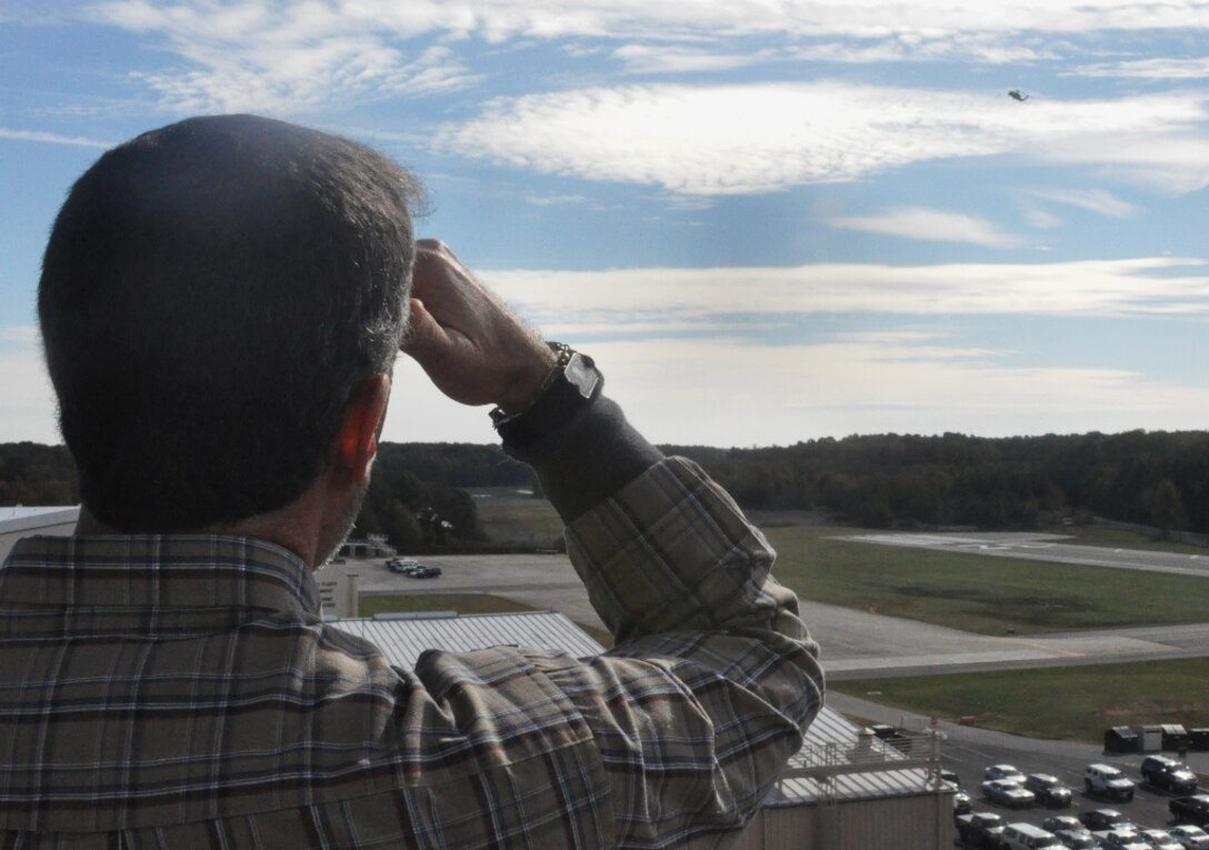 Daniel Brand, an air traffic controller at Felker Army Airfield, watches the runway during a U.S. Navy SH-60 Seahawk “touch-and-go” movement at Fort Eustis, Va., Nov. 7, 2012. The seven ATCs working the tower at Felker have more than 125 years combined experience working in military and civilian ATC capacities, and are often touted by visiting pilots as among “the best controllers up and down the east coast.” (U.S. Air Force photo by Senior Airman Jason J. Brown/Released)