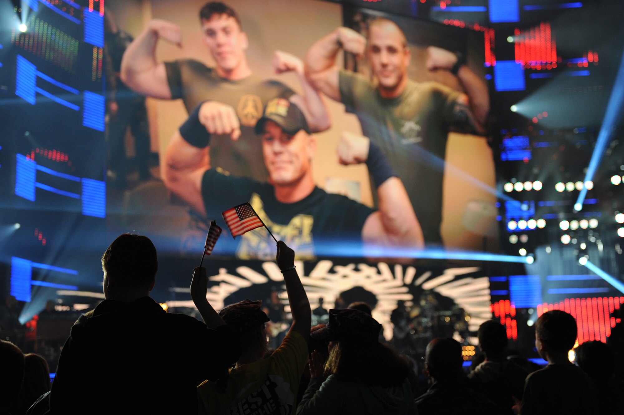 Active duty Service members and their families filled the Norfolk Scope Arena, Norfolk, Va., during a live World Wrestling Entertainment show, Dec. 9, 2012. The show was part of the 10th annual WWE "Tribute to the Troops" week honoring active duty members of the U.S. Armed Forces. (U.S. Navy photo by Mass Communication Specialist 1st Class Molly A. Burgess/Released)