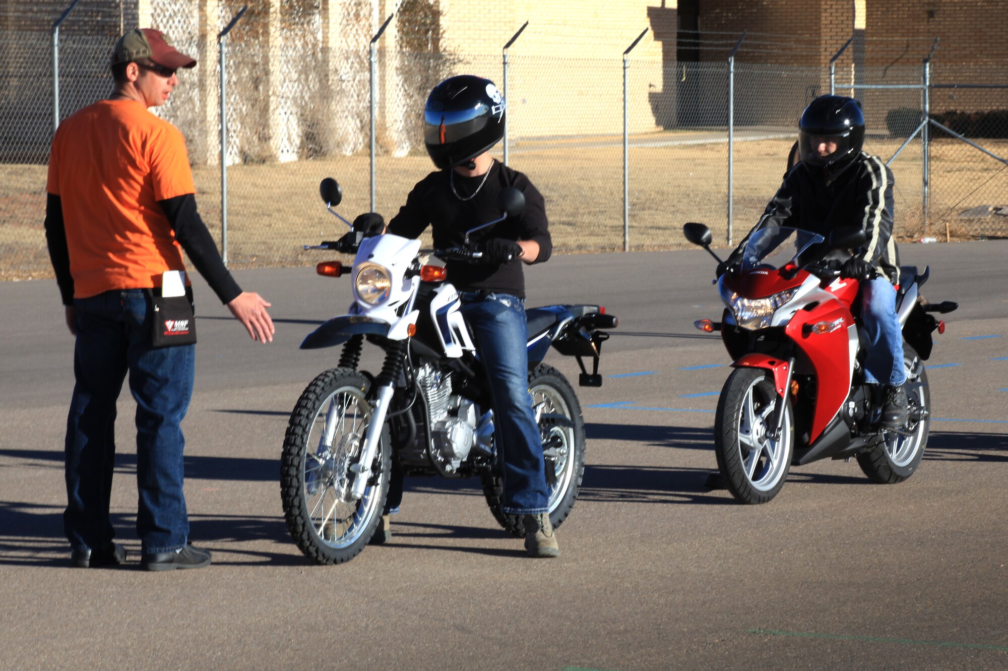Airmen line up for an exercise during the Motorcycle Safety Foundation’s Beginner Rider Course at Cannon Air Force Base, N.M., Dec. 7, 2012.  The base recently purchased 13 new motorcycles for the class in order to offer riders a chance to sample the bike they prefer while learning the skills of a safe and responsible driver.  (U.S. Air Force photo/Senior Airman Jette Carr)