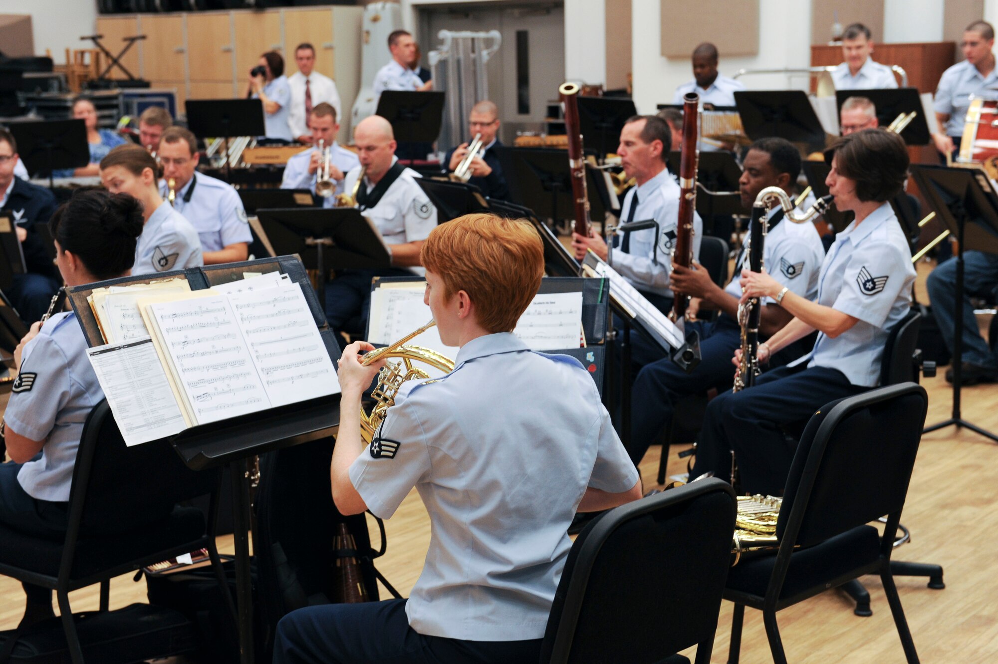 U.S. Air Force Airmen assigned to the Heritage of America band rehearse for holiday performances at Langley Air Force Base, Va., Dec. 3, 2012. The band performed a live rehearsal for students visiting from York High School. (U.S. Air Force photo by Staff Sgt. Ciara Wymbs/Released)