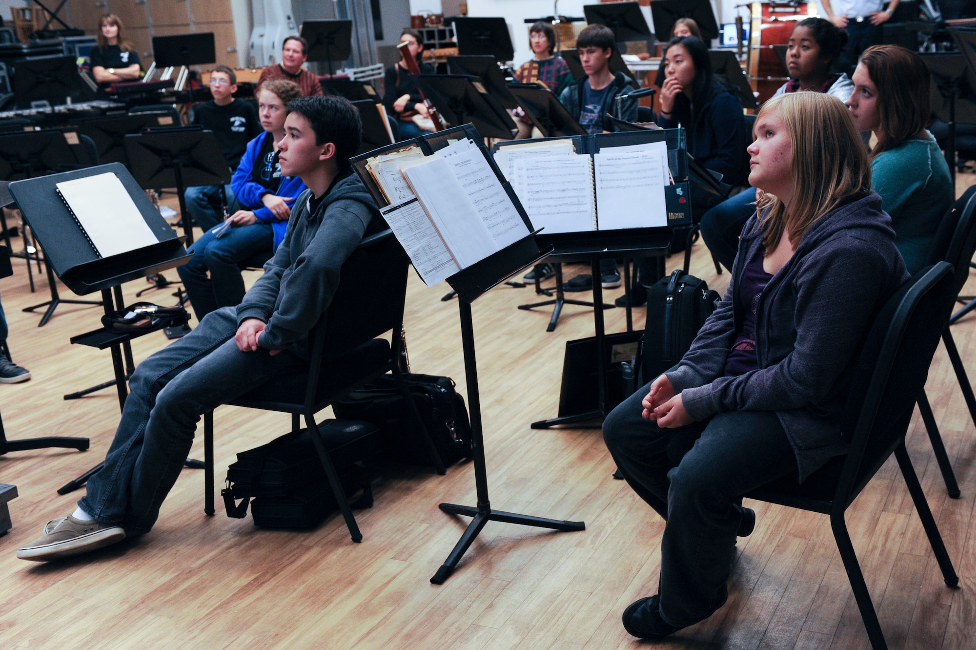 Students from York High School listen as they are briefed on the U.S. Air Force Heritage of America band’s abilities at Langley Air Force Base, Va., Dec. 3, 2012. The students were given information on requirements for entry into the band. (U.S. Air Force photo by Staff Sgt. Ciara Wymbs/Released)