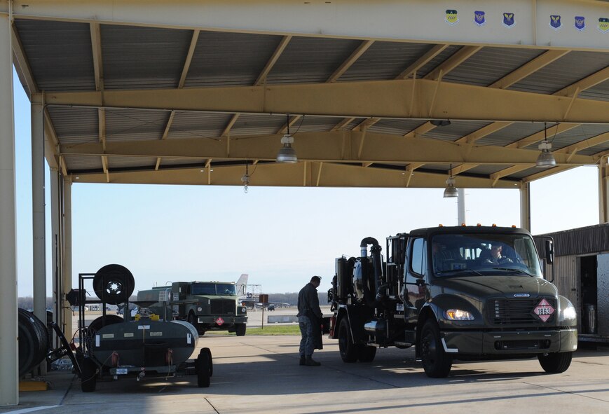 Senior Airman Joel Mitchell, 2nd Logistics Readiness Squadron, checks an R-12 hydrant truck for any abnormalities on Barksdale Air Force Base, La., Dec. 10. The hydrant truck acts as a portable pump, moving fuel between the aircraft and the fuel storage tanks below the flightline, filtering it during the process. This process is much faster than using tanker trucks to refuel aircraft. (U.S. Air Force photo/Airman 1st Class Benjamin Gonsier)
