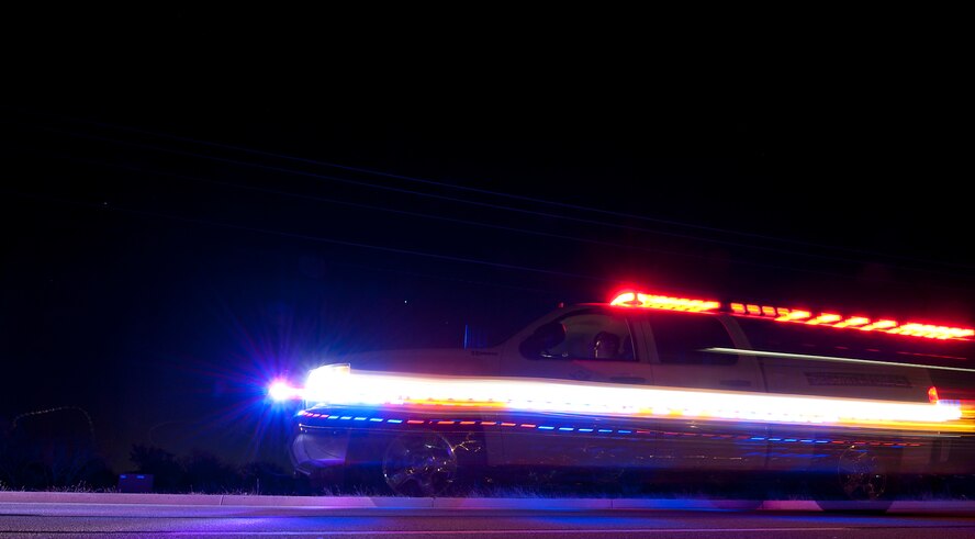 Senior Airman Cully Streans, 7th Security Forces Squadron, patrols the streets of Dyess Dec. 4, 2012, at Dyess Air Force Base, Texas. Security forces works in two shifts, day-shift from 6 a.m.-6 p.m. and mid-shift from 6 p.m.-6 a.m. Even though the mid-shift starts at 6 p.m., Airmen arrive earlier to attend guard mount, where they are briefed about what they’re going to do for the night and if anything significant happened during the prior shift. The 7th SFS faces unique challenges at night, such as DUIs, DWIs and underage drinking. (U.S. Air Force photo by Airman 1st Class Damon Kasberg/ Released)