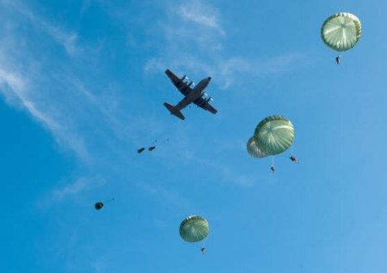 More than 1,600 paratroopers drop on Sicily Drop Zone during the 15th Annual Randy Oler Memorial Operation Toy Drop at Fort Bragg, N.C., Dec. 8, 2012. Soldiers donated a new, unwrapped toy yesterday at Pope Army Airfield's Green Ramp to earn a seat for today's jump and also the chance to earn airborne jump wings from participating allied nation jumpmasters. Toy Drop, hosted by the U.S. Army Civil Affairs & Psychological Operations Command (Airborne), is the largest combined airborne operation in the world. (U.S. Army photo/Timothy Hale)