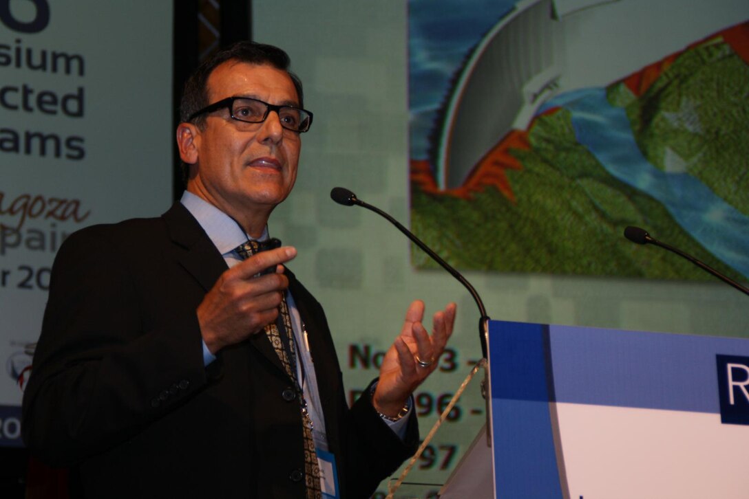 Alberto Gonzalez, Portugues Dam project manager, makes a point while speaking about the transition to a Roller Compacted Concrete Dam during a presentation at a conference in Zaragoza, Spain.  Gonzalez was one of three Jacksonville District representatives who participated.  Photo courtesy Alberto Gonzalez.  