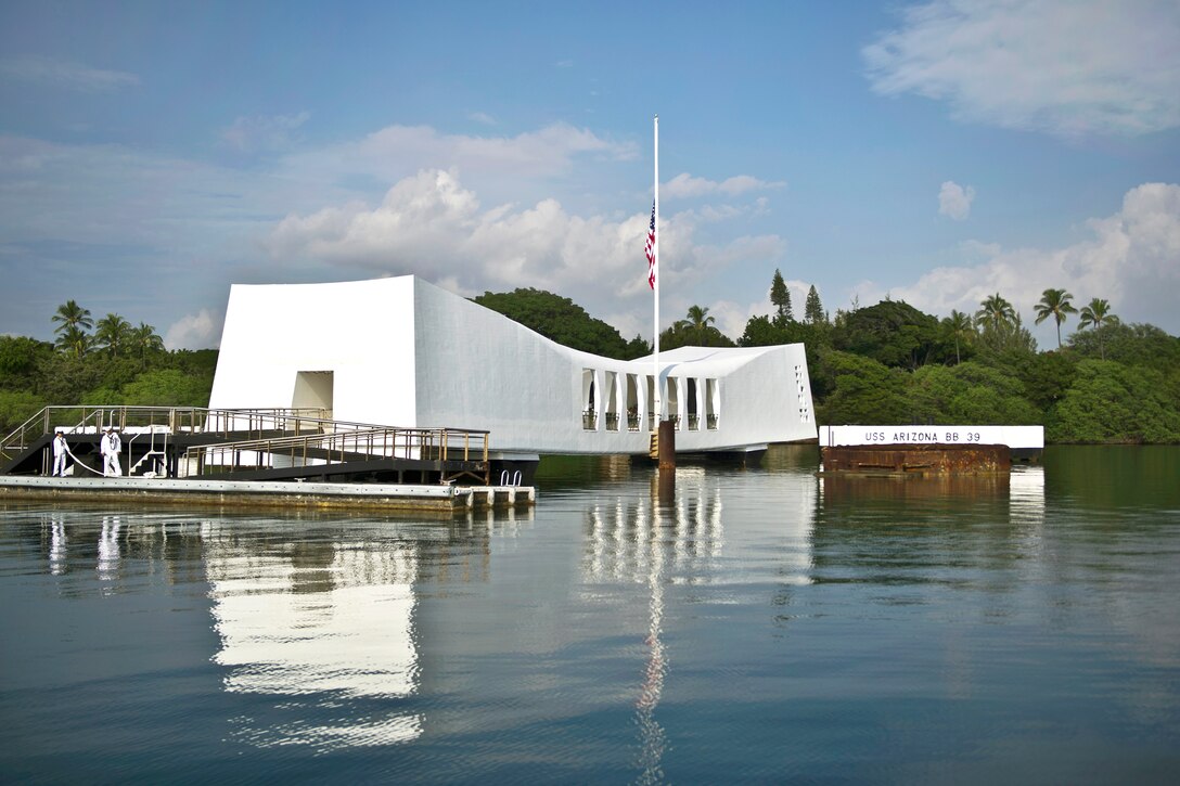 Pearl Harbor survivors, military and civilian leaders gather at the USS Arizona Memorial in Honolulu to lay wreaths and pay tribute Dec. 7, 2012, in a remembrance ceremony marking the 71st anniversary of the attack on Pearl Harbor and the island of Oahu.