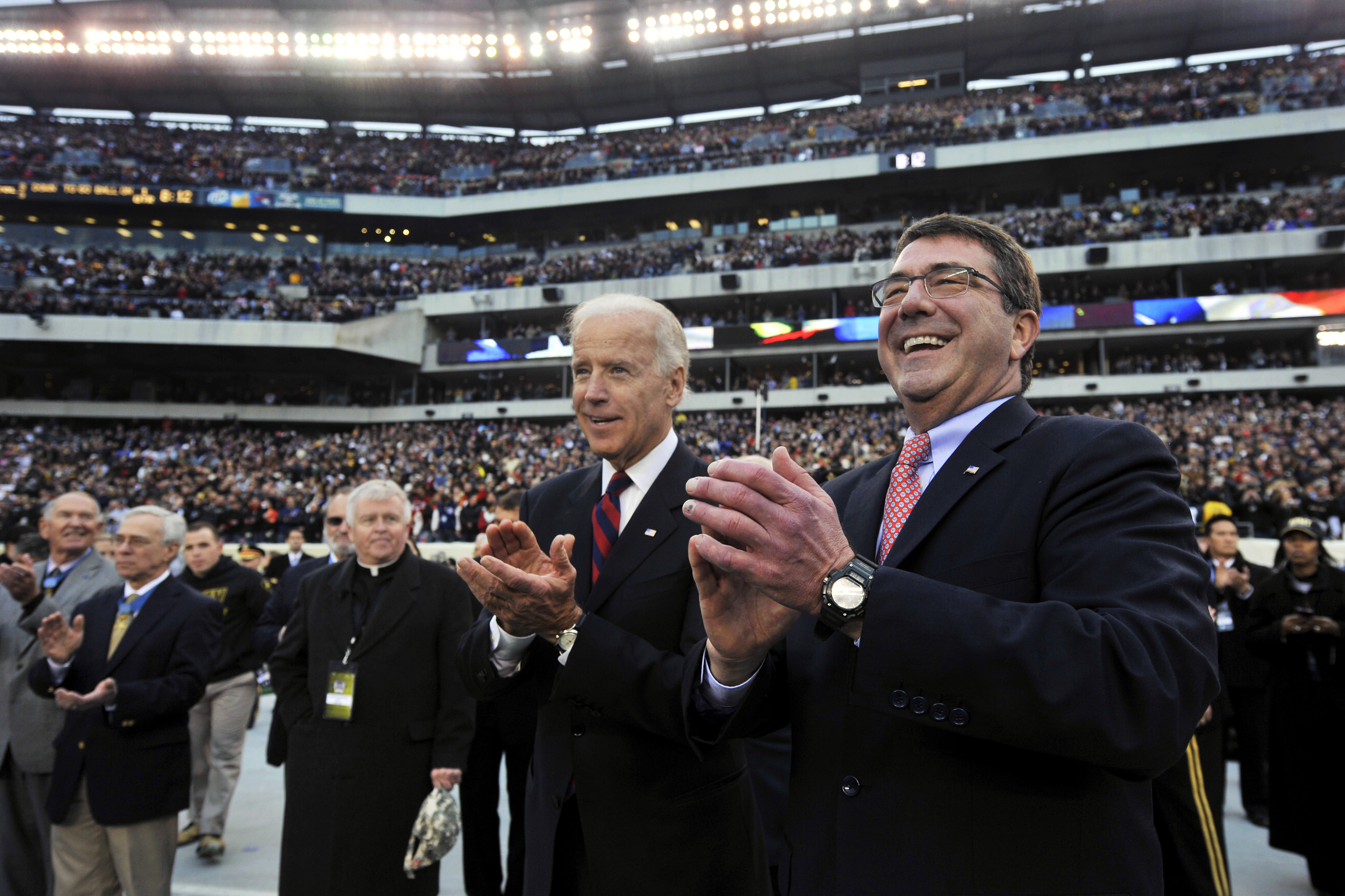 vice-president-joe-biden-left-and-deputy-defense-secretary-ashton-b-carter-right-applaud-after-the