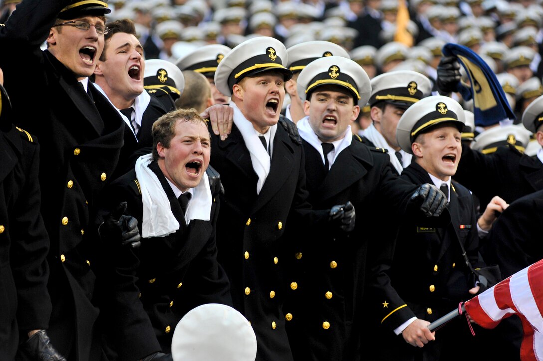 Navy midshipmen cheer for their team during the Army-Navy football game at Lincoln Financial Field in Philadelphia, Dec. 8, 2012. Navy beat Army 17-13. 