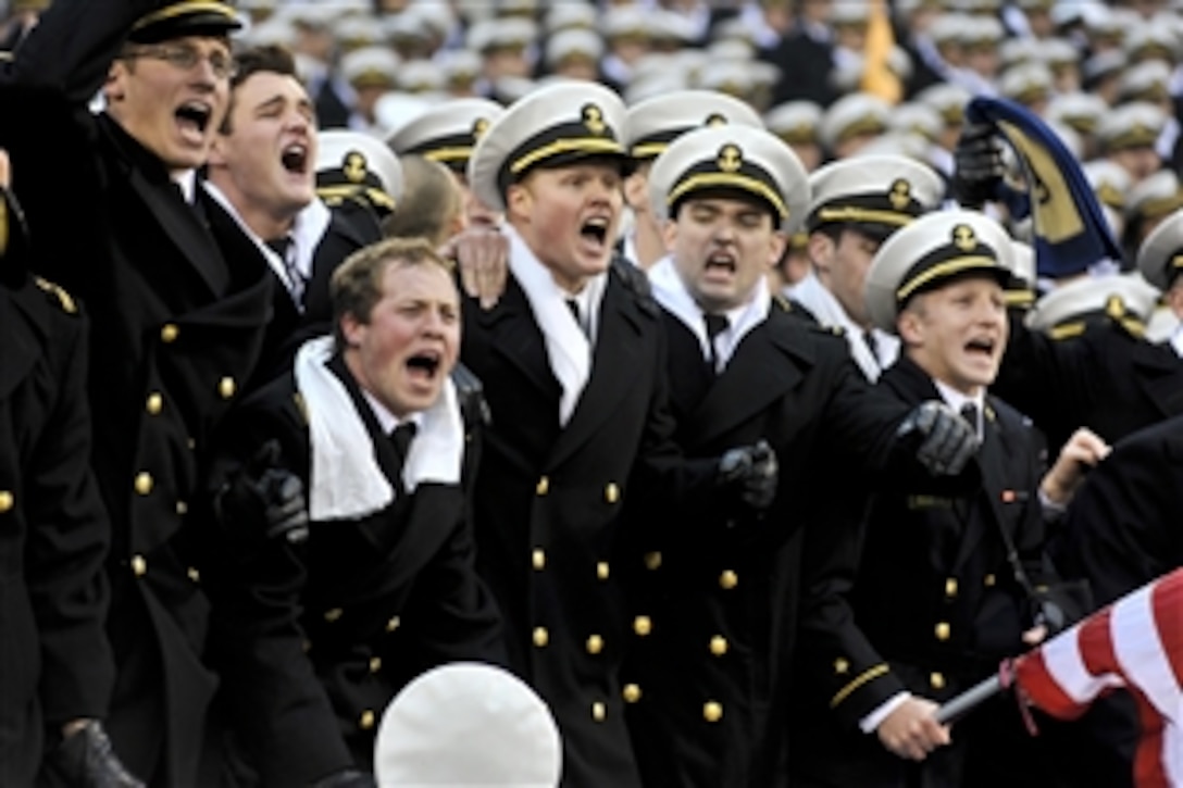 Navy midshipmen cheer for their team during the Army-Navy football game at Lincoln Financial Field in Philadelphia, Dec. 8, 2012. Navy beat Army 17-13.