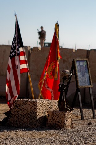 A Marine stands post during a memorial service honoring Lance Cpl. Anthony Denier, Dec. 8, 2012. Denier, a rifleman with India Company, 3rd Battalion, 9th Marine Regiment, Regimental Combat Team 7, died while conducting combat operations in Marjah, Afghanistan, Dec. 2, 2012.