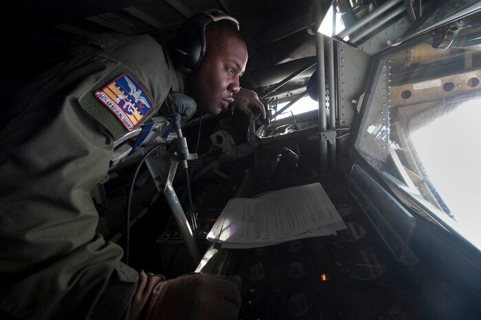 Tech. Sgt. Davie Hobbs, 384th Air Refueling Squadron boom operator, McConnell Air Force Base, Kan., scans for aircraft to refuel from the boom of a  KC-135 Stratotanker during a Mission Employment Phase exercise Dec. 9, 2012, over the Nevada Test and Training Range. The ME Phase exercise incorporates Air Force capabilities in diverse scenarios which can include aircraft in conjunction with space and cyberspace assets. (U.S. Air Force photo by Staff Sgt. Christopher Hubenthal)
