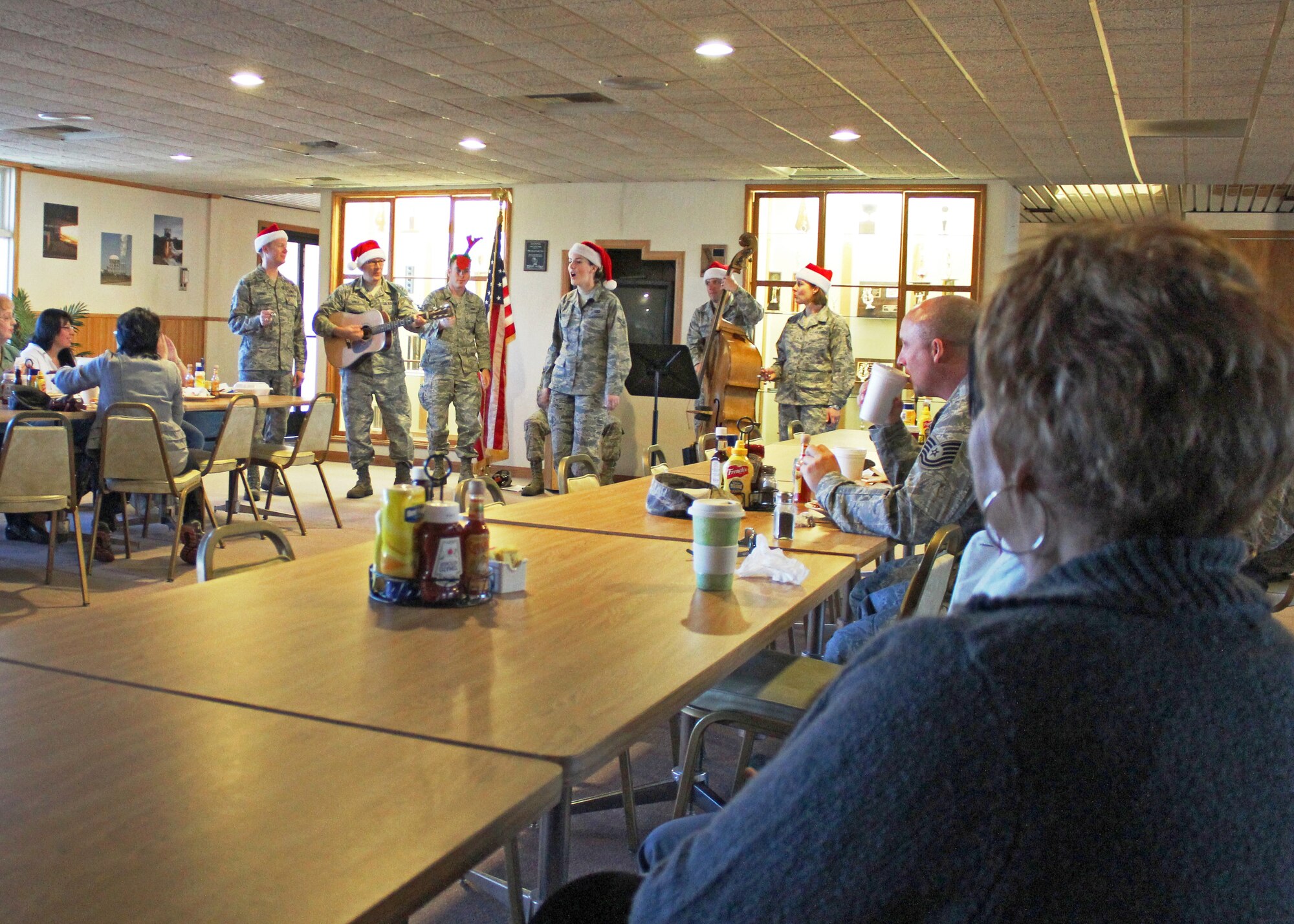 U.S. Air Force Band of the Golden West's Mobility quintet started off their day at the Air Force Research Laboratory Detachment 7's Club Rocket Room in the morning.  The group visited various units throughout the day bringing holiday sounds to Team Edwards.  (U.S. Air Force photo by Melissa Buchanan)