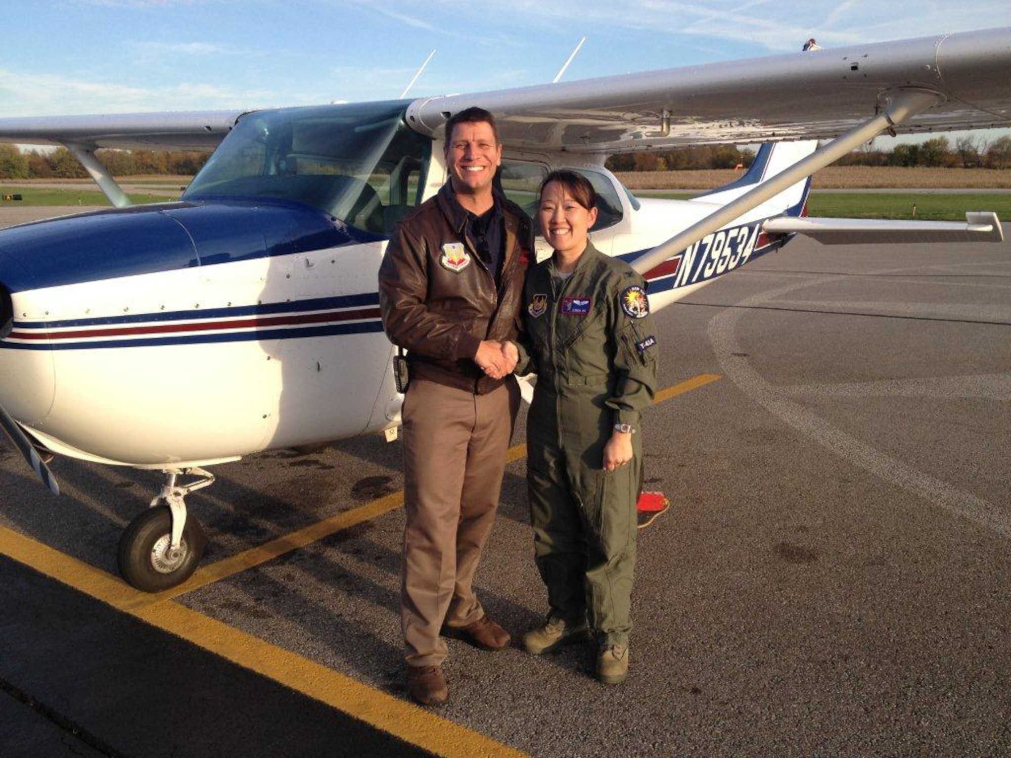 Col. (Dr.) Lynda Vu and her flight instructor.