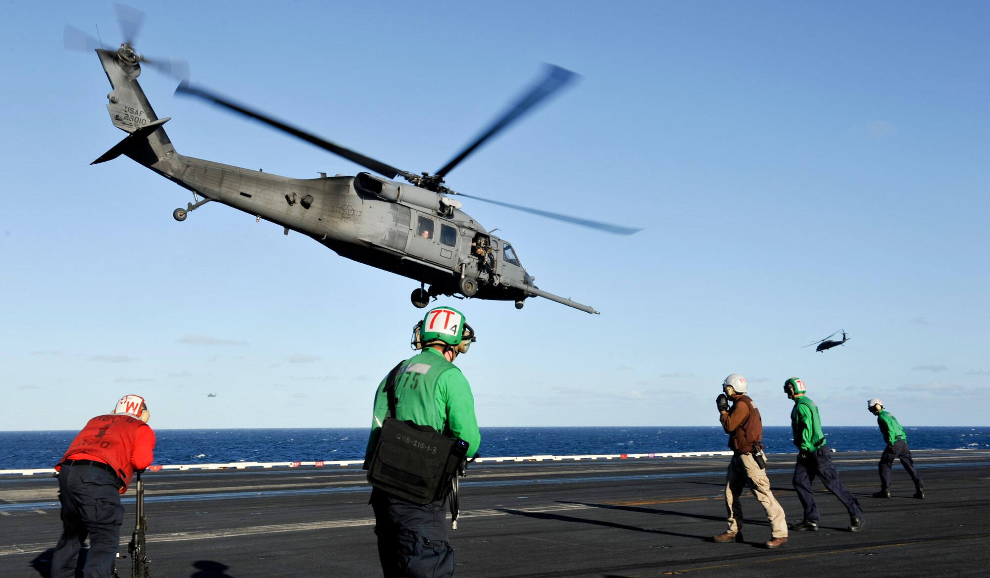 A U.S. Air Force HH-60G Pavehawk helicopter lifts off the aircraft carrier USS Nimitz (CVN 68). Nimitz is currently underway participating in the ship’s Joint Task Force Exercise. (U.S. Navy photo by Mass Communication Specialist 3rd Class Ryan J. Mayes/Released)