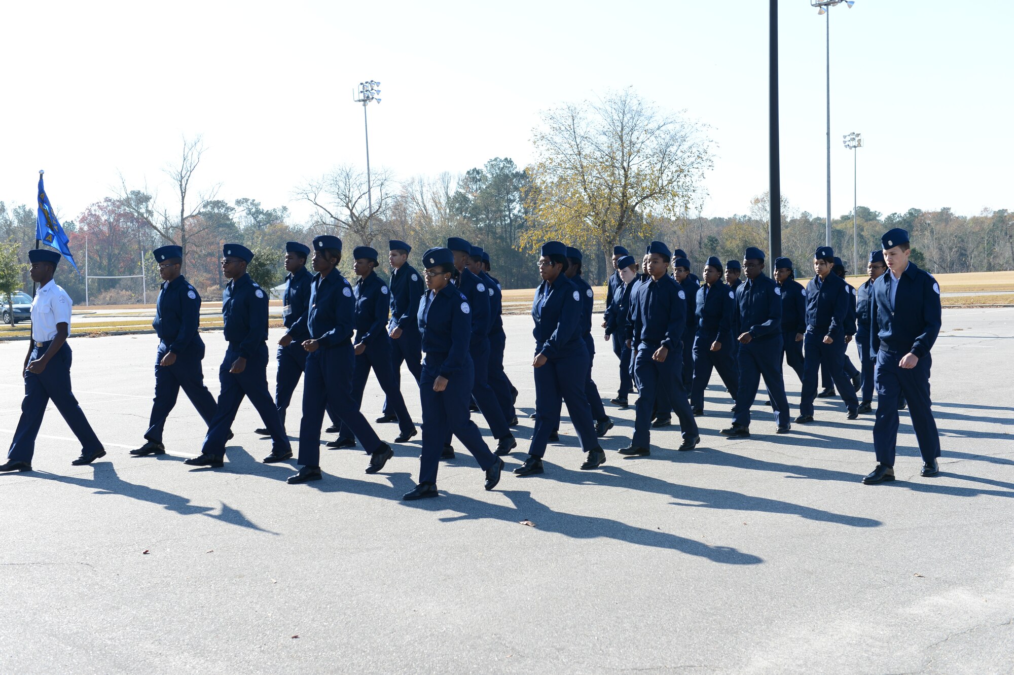 An Air Force Junior ROTC drill team performs during a drill competition at Sumter High School, S.C., Nov. 29, 2012. Four other Airmen from Shaw Air Force Base, S.C., volunteered to judge the competition. Afterwards, the Airmen spoke to each flight about being in the military. (U.S. Air Force photo by Airman 1st Class Krystal M. Jeffers/Released)