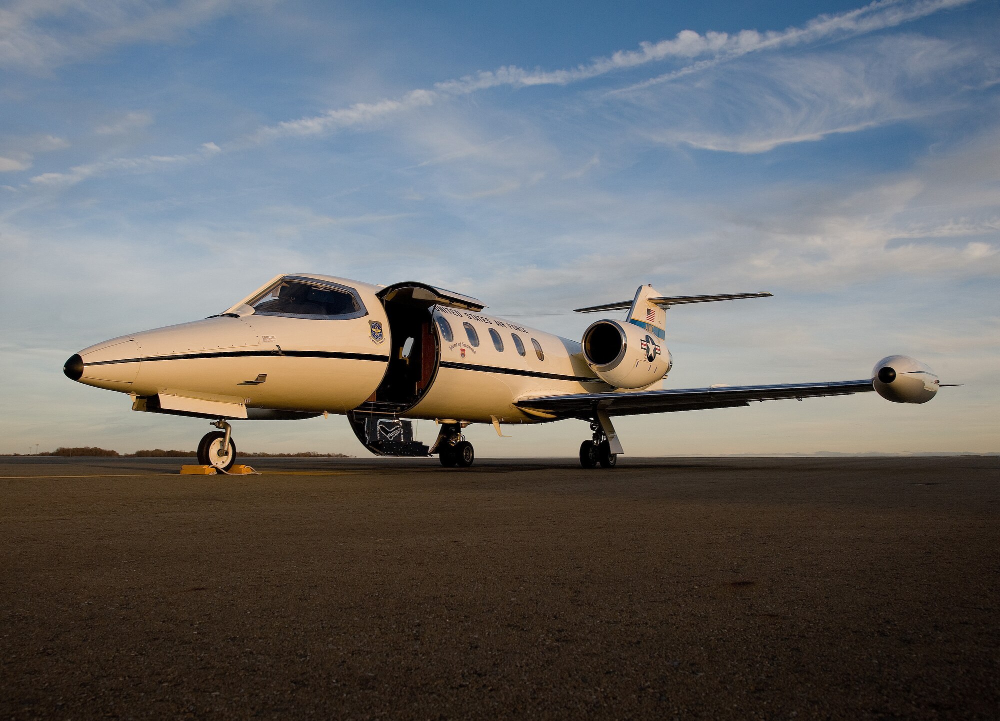 A C-21A aircraft sits parked on the flightline at Dover Air Force Base, Del., before transporting Gen. Paul J. Selva, Air Mobility Command commander, Scott Air Force Base, Ill., at the end of his visit to the 436th Airlift Wing, Dec. 6, 2012. Selva visited the base to introduce himself to Team Dover at an All Call during a tour of AMC wings throughout December. As commander of AMC, Selva leads all mobility air forces comprised of nearly 134,000 personnel from the active duty, Air National Guard , and Air Force Reserve. (U.S. Air Force photo by Greg L. Davis)