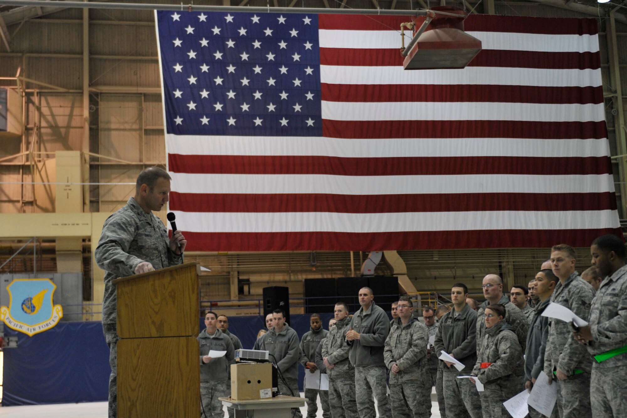 JOINT BASE ELMENDORF-RICHARDSON, Alaska -- Air Force Col. Dirk Smith, 3rd Wing commander, briefs 3rd Wing service members during the 3rd Wing Commander's Briefing about sexual assault Dec. 6. The commander's brief is done to maintain high morale in the workplace to ensure that the Air Force mission is carried out without failure. (U.S. Air Force photo/Airman Ty-Rico Lea)

