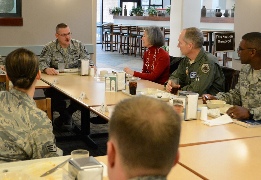 U.S. Air Force Master Sgt. Micheal Davis, 9th Air Force logistics analyst, speaks with General Mike Hostage, Air Combat Command commander at the chief Master Sgt. Emerson Williams Dining Facility, December 7, 2012. Gen. Hostage attended the open forum breakfast to discuss topics on Airmen’s minds. (U.S. Air Force photo by Senior Airman Tabatha Zarrella/ Released) 