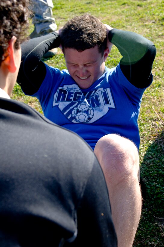 Braden Miller, a native of Middlesex, Va., finishes the sit-up portion of the Physical Ability Stamina Test during the special operations combine Dec., 6, 2012, at the Shellbank Fitness Center at Langley Air Force Base, Va. The combine some of America’s best and brightest hoping to fill the intense special operations career fields. (U.S. Air Force photo by Airman 1st Class R. Alex Durbin/Released)
