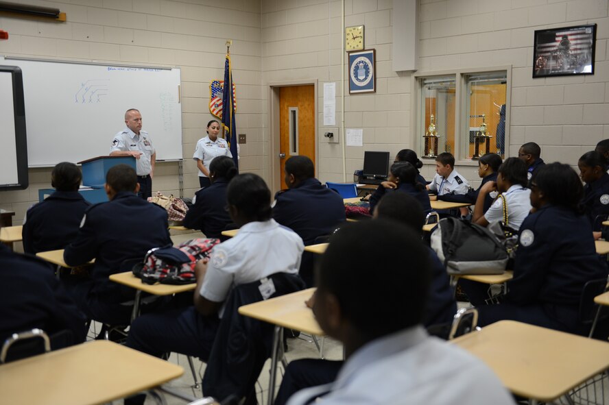 Staff Sgt. Julie Walker, U.S. Air Forces Central Command postal operations manager, and Master Sgt. Thomas Kime, 20th Logistics Readiness Squadron section chief of fuels distribution, speak to Air Force Junior ROTC cadets about being in the military at Sumter High School, S.C., Nov. 29, 2012. Walker, Kime, Staff Sgt. Shawn Ika Danielson, 20th Logistics Readiness Squadron fuels distribution supervisor, and Tech Sgt. Jousha Boswell, AFCENT postal operations manager, volunteered to judge a six-team drill competition at Sumter High for JROTC cadets in 9th to 12th grade. (U.S. Air Force photo by Airman 1st Class Krystal M. Jeffers/Released)