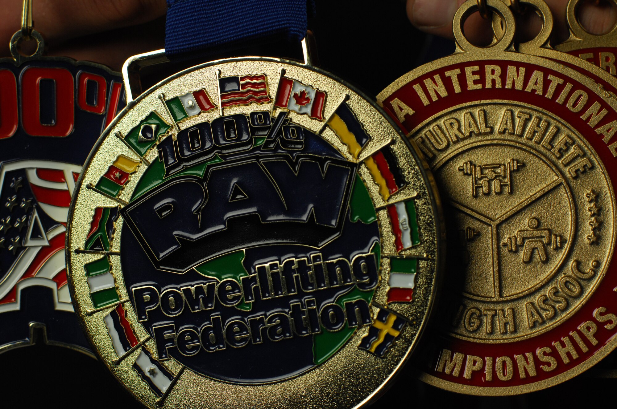 MINOT AIR FORCE, N.D. – Senior Airman Robert Lesser and Airman 1st Class Austin Pappas, both crew chiefs assigned to the 5th Aircraft Maintenance Squadron, proved their worth at a local powerlifting competition Dec. 1 at the YMCA in Minot, N.D. For Lesser, it was an afternoon of record breaking scores, while for Pappas, it was a complete domination over competitors. (U.S. Air Force photo/Senior Airman Brittany Y. Auld)