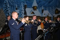 Musicians from the Band of West perform during the Holiday in Blue concert Dec. 7 at the Edgewood Independent School District Theatre of Performing Arts in San Antonio.  The Band of the West provides hundreds of performances to military and civilian audiences throughout the year.  (U.S. Air Force photo by Joel Martinez)