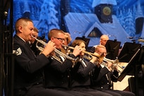 Musicians from the Band of West perform during the Holiday in Blue concert Dec. 7 at the Edgewood Independent School District Theatre of Performing Arts in San Antonio.  The Band of the West provides hundreds of performances to military and civilian audiences throughout the year.  (U.S. Air Force photo/Joel Martinez)