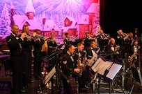 Members from the Band of the West perform during the Holiday in Blue concert Dec. 7 at the Edgewood Independent School District Theatre of Performing Arts in San Antonio.  The Band of the West provides hundreds of performances to military and civilian audiences throughout the year. (US Photo by Joel Martinez)