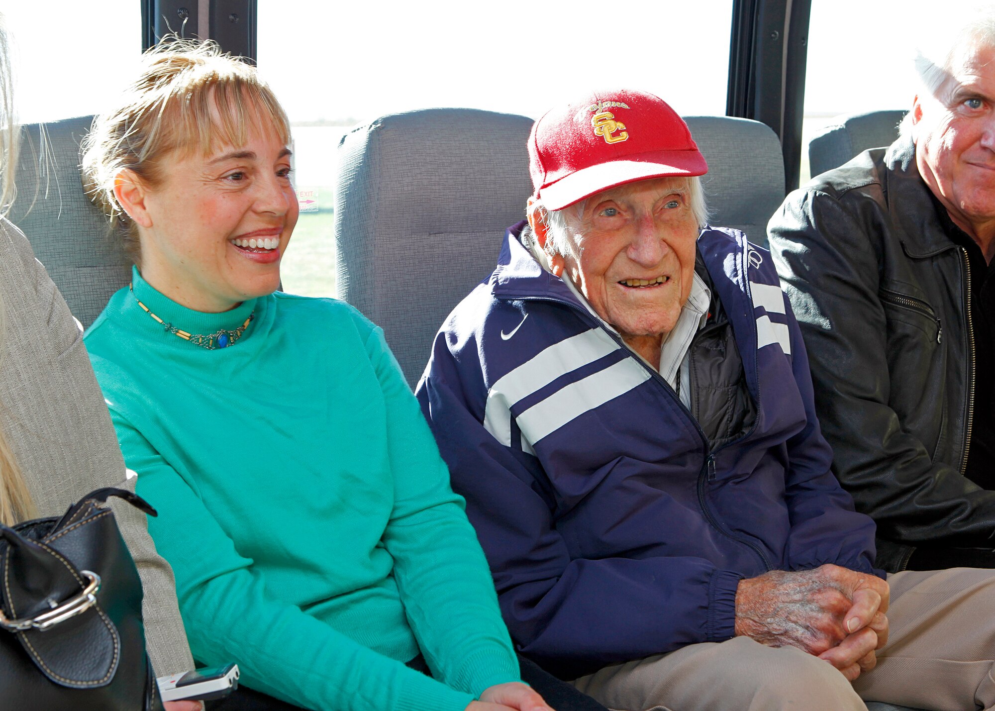 Nancy Koch-Castillo, new 412th Test Wing community support coordinator, met with Louis Zamperini during the Edwards Wingman Day Dec. 10, 2012. (U.S. Air Force photo by Jet Fabara)