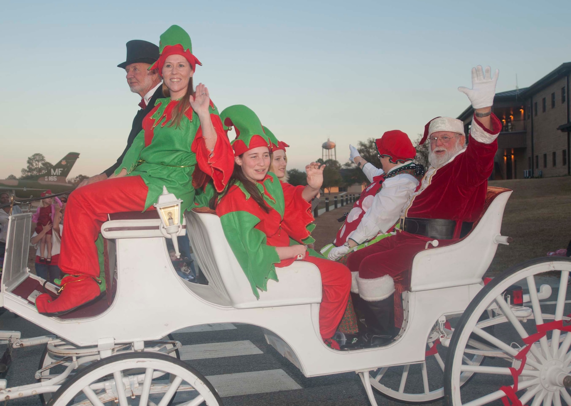 Santa Claus waves to family members of Moody Air Force Base, Ga., on Dec 7, 2012 during the Annual Base Tree Lighting and Holiday Parade.  The event included snowball pits, a parade and a tree lighting ceremony that honored deployed Airmen. (U.S. Air Force photo by Airman Paul Francis/Released)
