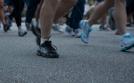 Runners participate in the Commander's Challenge Run at Joint Base Charleston - Air Base, Dec. 7, 2012. The Commander's Challenge is held monthly to test Team Charleston's fitness abilities . The run is open to all active-duty service members, DOD civilians and dependents. (U.S. Air Force photo/Airman 1st Class Ashlee Galloway)