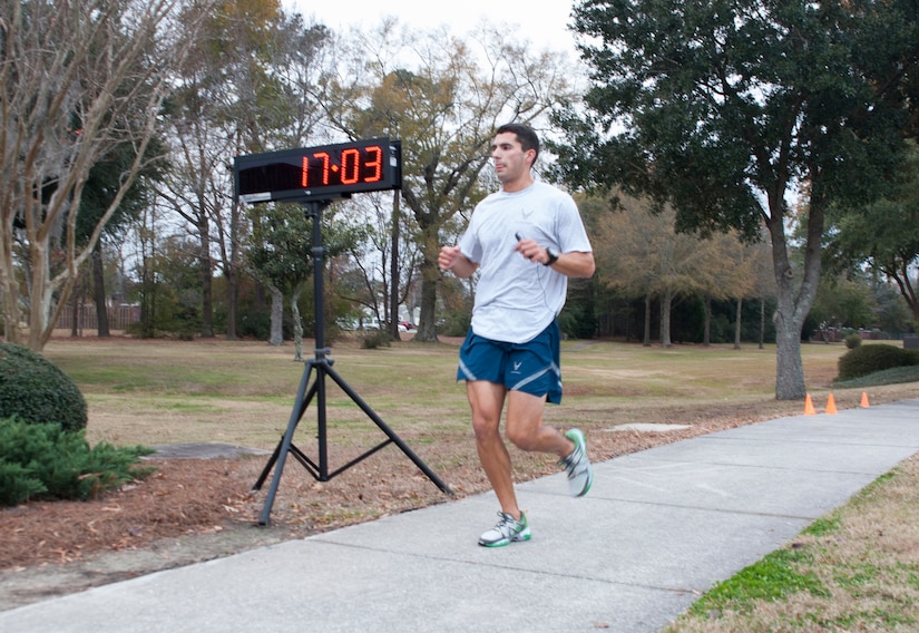 1st Lt. Brett King, 17th Airlift Squadron, finishes first with a time of 17:03 during the 5K Commander's Challenge Run at Joint Base Charleston - Air Base, Dec.7, 2012. (U.S. Air Force photo/Airman 1st Class Ashlee Galloway)